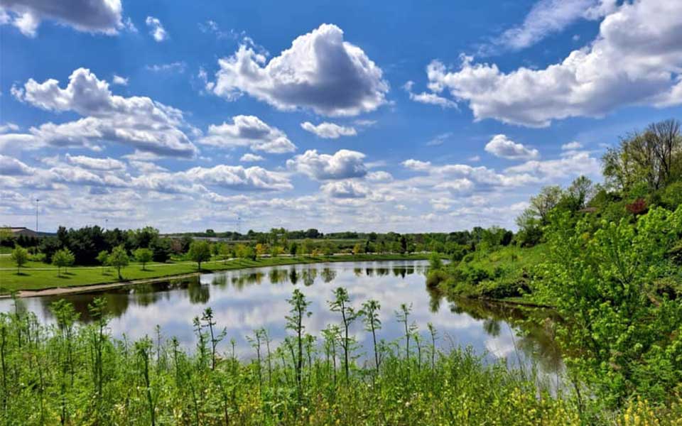 Lake with clouds reflecting off of water